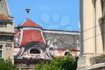 Original roof with angels of old house in historical city center. Lviv, Ukraine