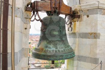 Ancient bell at the top of Leaning Tower in Pisa, Italy.