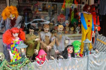 Amsterdam, the Netherlands -October 03, 2015: Horror party dress and souvenirs in the window of the popular shop in city centre
