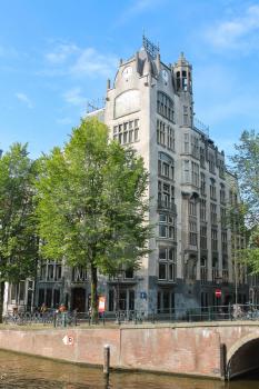 Amsterdam, the Netherlands -October 03, 2015: Building in the classic Dutch style in historic city centre. Amsterdam, the Netherlands