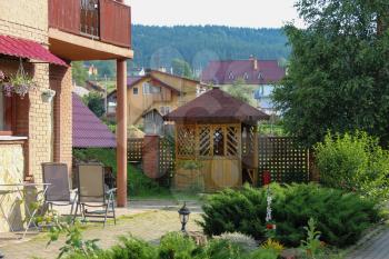 Modern cottage with porch and veranda. Carpathians, Ukraine