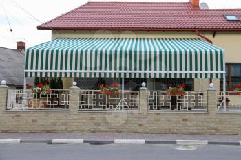 Modern cafe with outdoor terrace in Ukrainian Schodnica
