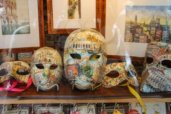 Venice, Italy - August 13, 2016: Traditional Venetian masks in window of souvenir store (San Marco)