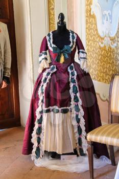 Villa Sorra, Italy - July 17, 2016: Vintage style dress on mannequin. Costumed reconstruction of historical events. Castelfranco Emilia, Modena