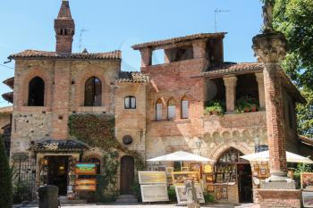 Grazzano Visconti, Italy - August 07, 2016: Small tourist souvenir shops in medieval castle
