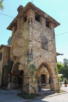 Grazzano Visconti, Italy - August 07, 2016: Stone tower of old medieval castle