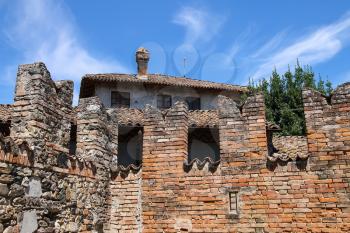 Fortification wall of ancient castle in Grazzano Visconti, Italy