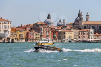 Venice, Italy - August 13, 2016: Passengers boats with tourists in the Adriatic Sea