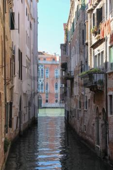 Narrow water street of historic center of Venice, San Marco. Italy