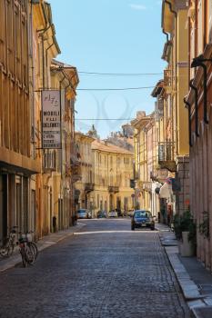 Piacenza, Italy - August 7, 2016:Narrow old street of historic city centre