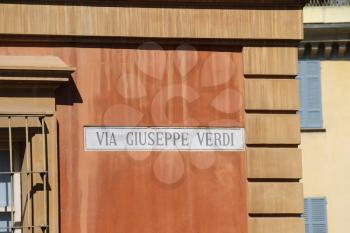 Piacenza, Italy - August 7, 2016: Street name indicator on the wall of house (Giuseppe Verdi)