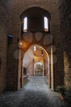 Arched passage in ancient fortress. Vignola, Italy