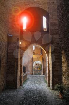 Arched passage in ancient fortress. Vignola, Italy