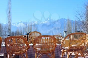 Royalty Free Photo of Wicker Chairs in a Restaurant
