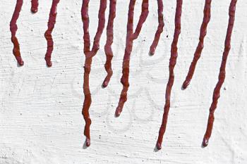 Royalty Free Photo of Red Paint Streaks on a Wall