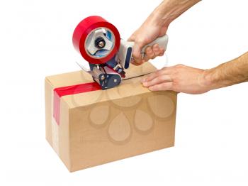 Royalty Free Photo of a Person Taping a Box
