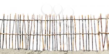 fence of twigs isolated on white background