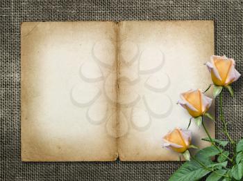 Royalty Free Photo of a Vintage Card With Roses on Sackcloth