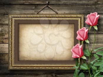 Old vintage frame for photos and a bouquet of yellow  roses