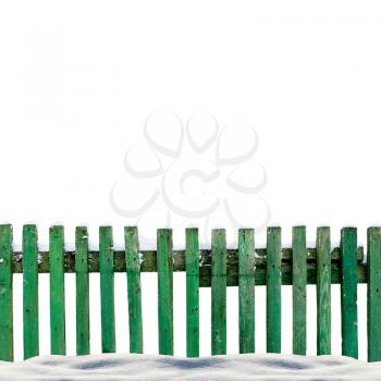 snowy old green wooden fence isolaten on white background