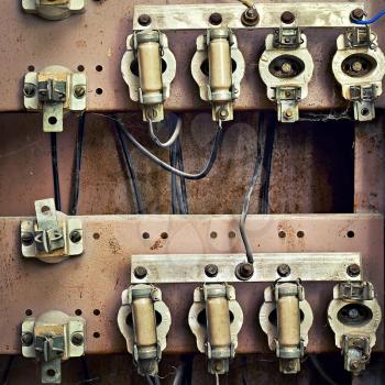 old switchboard with fuses in the background