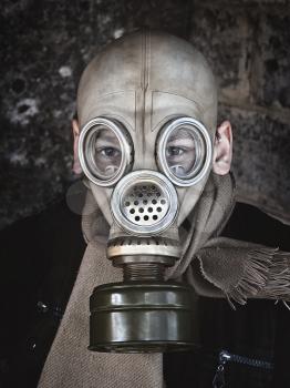 man in an old gas mask closeup