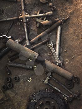 old parts and tools on the workshop floor