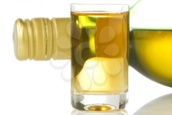 Royalty Free Photo of a Bottle and Shot Glass