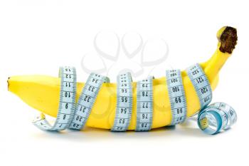 Royalty Free Photo of a Banana Wrapped in Measuring Tape