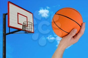 Royalty Free Photo of a Person Playing Basketball