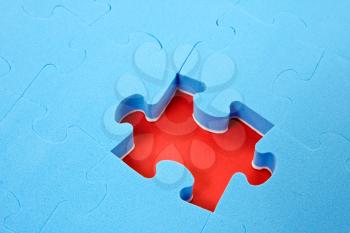 Royalty Free Photo of a Puzzle With a Missing Piece