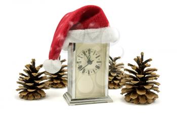 Royalty Free Photo of a Clock With a Santa Hat