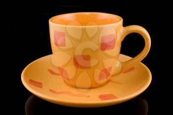 Royalty Free Photo of a Yellow Coffee Cup