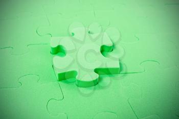 Royalty Free Photo of a Green Puzzle