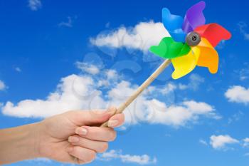 Royalty Free Photo of a Person Holding a Pinwheel