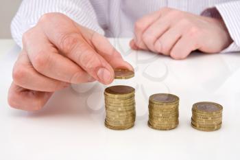Royalty Free Photo of a Businessman With Coins