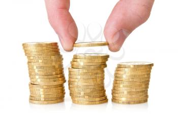 Royalty Free Photo of a Person Stacking Coins