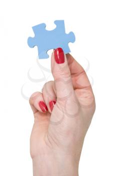 Royalty Free Photo of a Woman Holding a Puzzle Piece