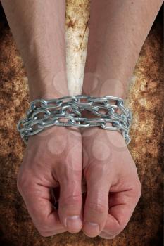 Royalty Free Photo of a Person With Chained Hands