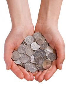 Royalty Free Photo of a Person Holding Coins
