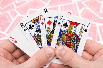 Royalty Free Photo of a Person Playing Cards