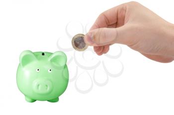 Royalty Free Photo of a Person With a Piggy Bank