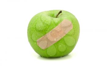 Royalty Free Photo of an Apple With a Bandaid
