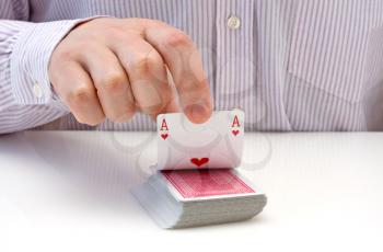 Royalty Free Photo of a Man Holding Playing Cards