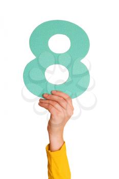 Royalty Free Photo of a Person Holding the Number Eight