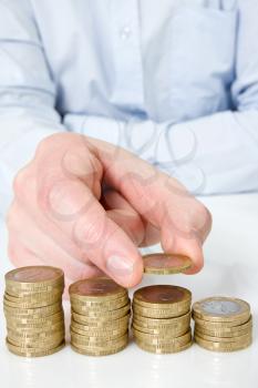 Royalty Free Photo of a Businessman With Coins