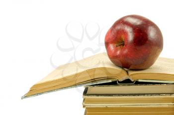 Royalty Free Photo of an Apple on Books
