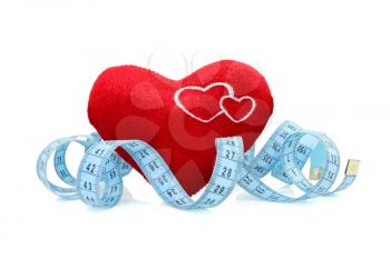 Royalty Free Photo of a Heart With Measuring Tape