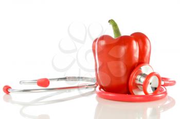 Royalty Free Photo of a Stethoscope and a Red Pepper