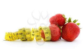 Royalty Free Photo of Strawberries and Measuring Tape